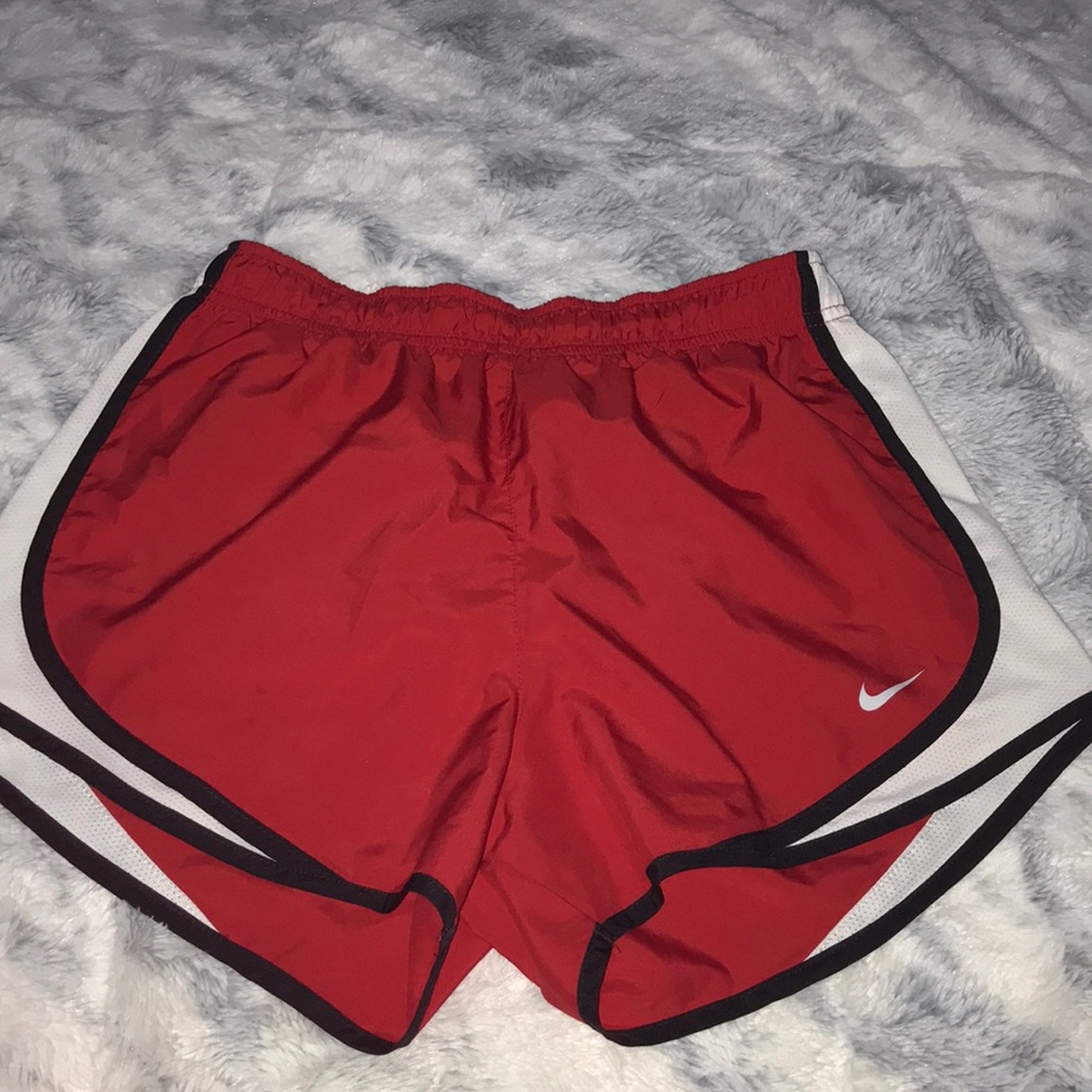 red nike shorts